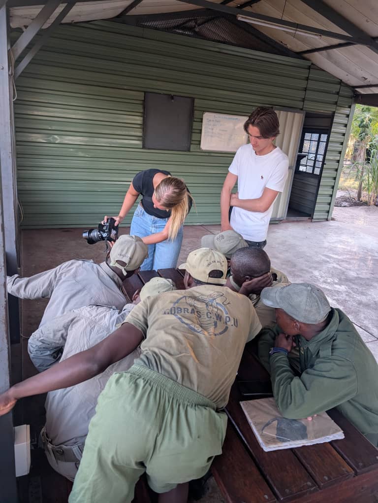 Camera training by the guests for the CRCI community scouts, Zimbabwe 
