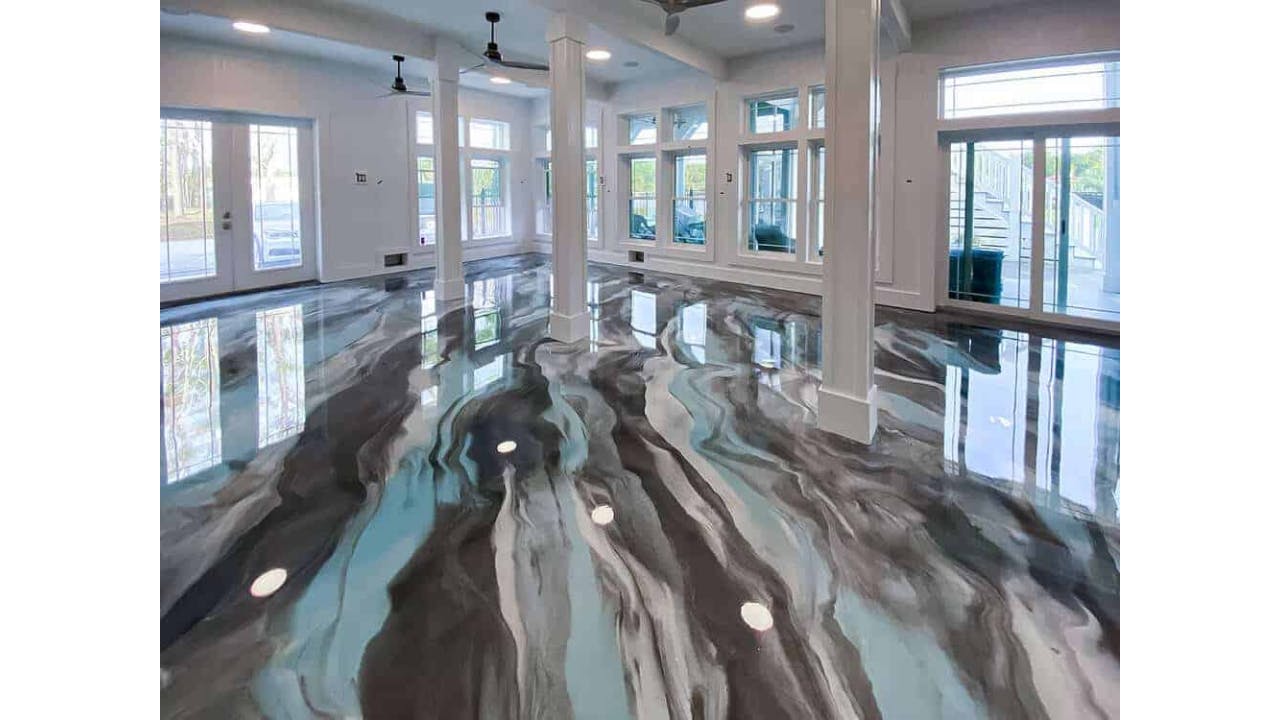 Photo of room with epoxy floor in marbled gray, white and blue.