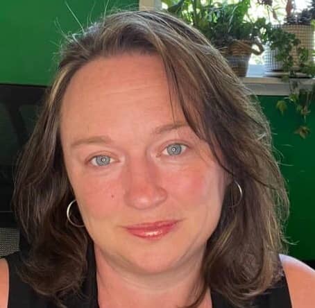 headshot of a woman with brown hair