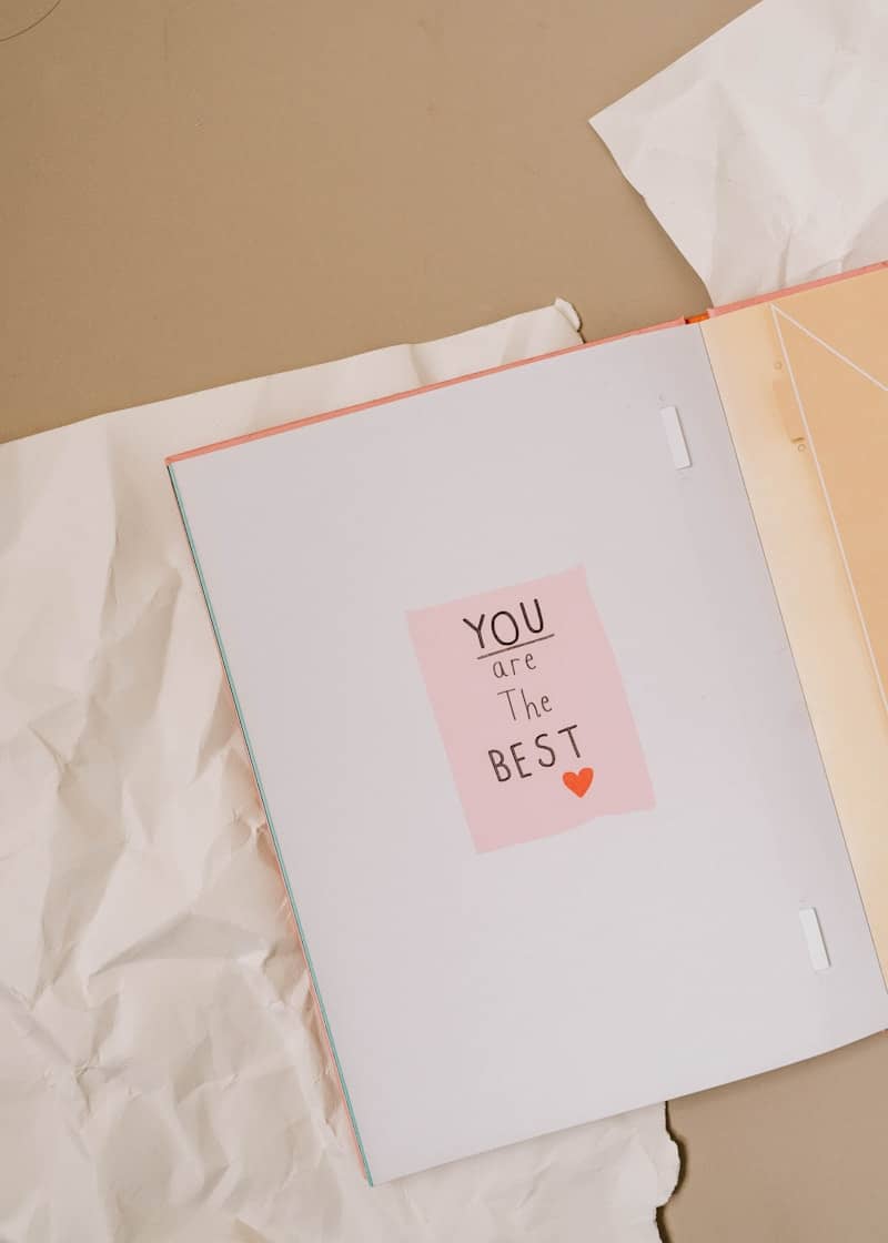 A couple of pieces of paper sitting on top of a table