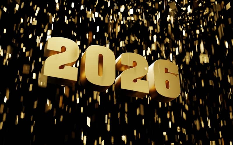 Golden 2026 text with falling confetti