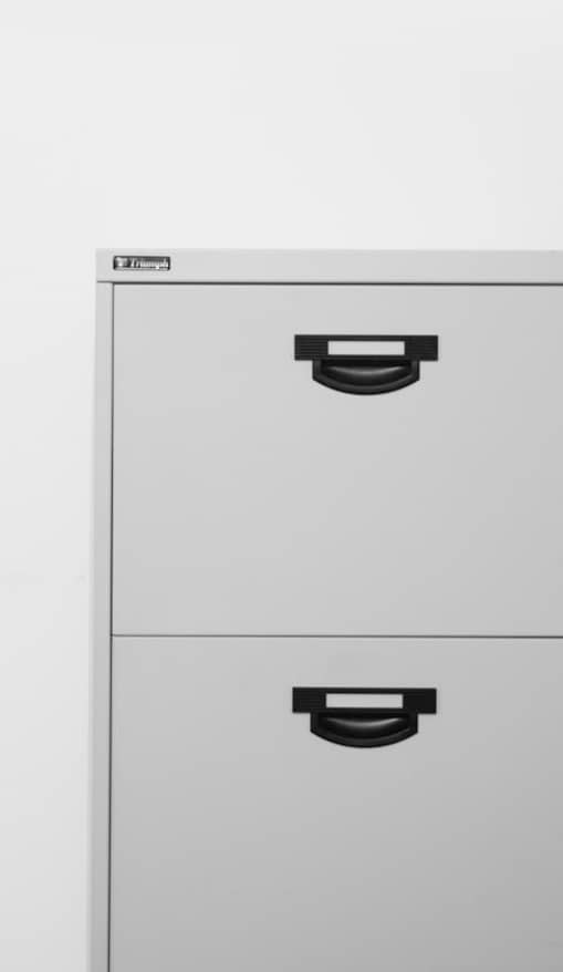 gray metal locker on white surface