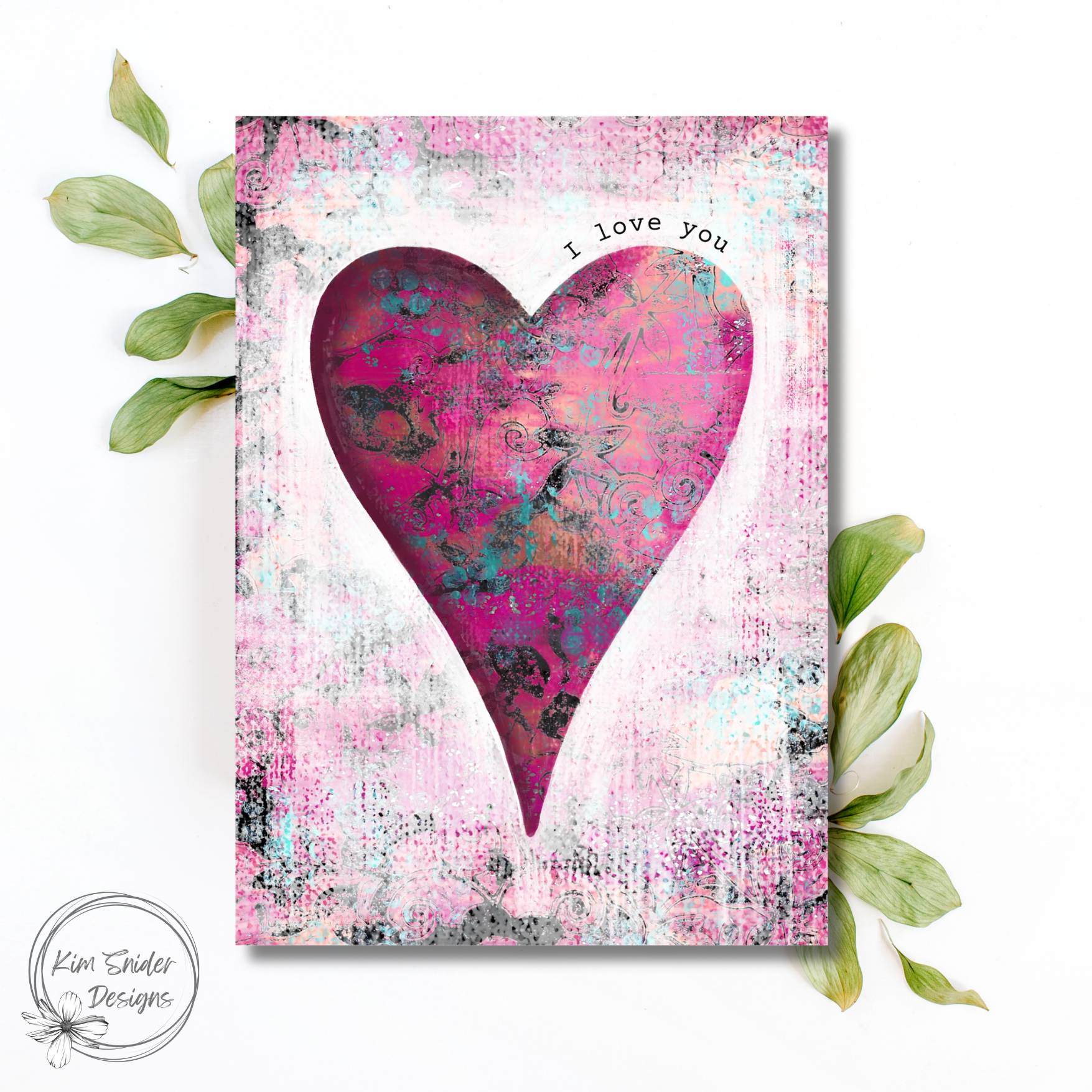 This is the free card on a bed of leaves with my logo in the bottom left corner: Kim Snider Designs