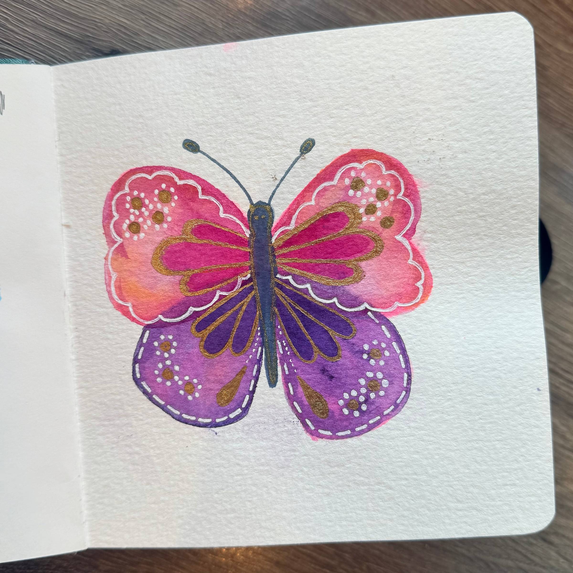 watercolor butterfly with pen details in my sketchbook