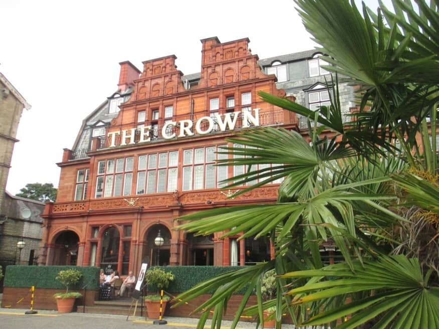 exterior of Crown pub and hotel - edwardian red brick building 