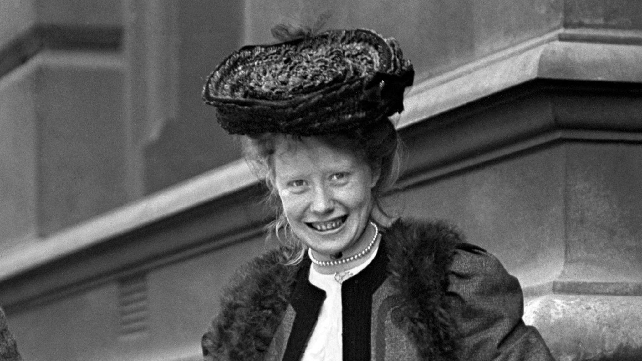black and white photo of woman in hat 1920s