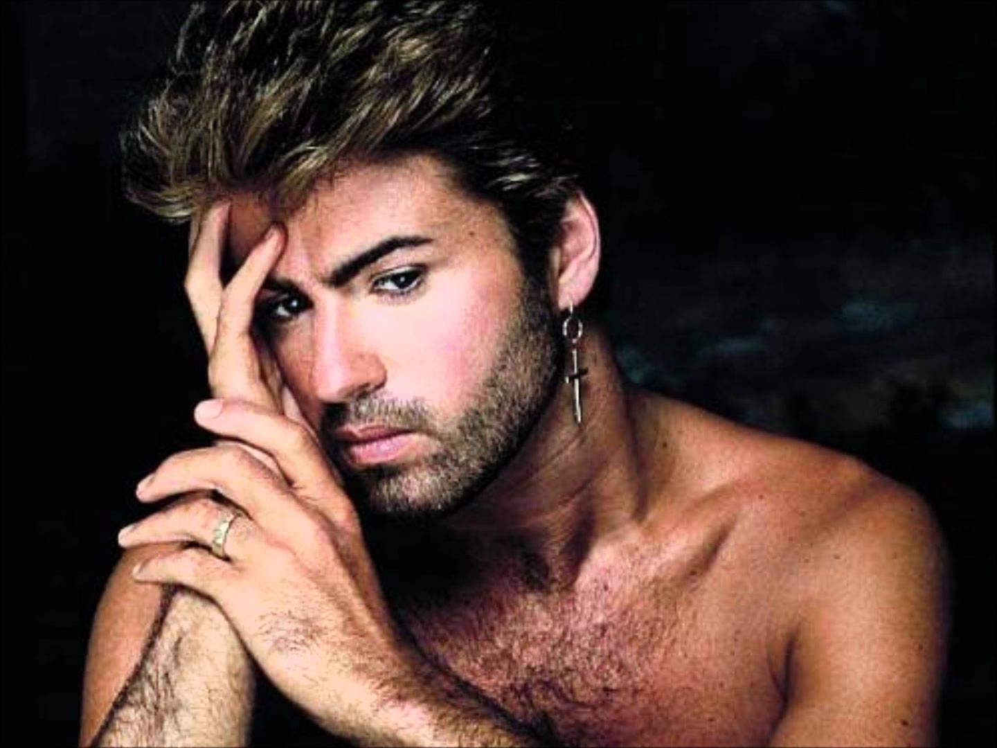 very young George Michael looking sultry