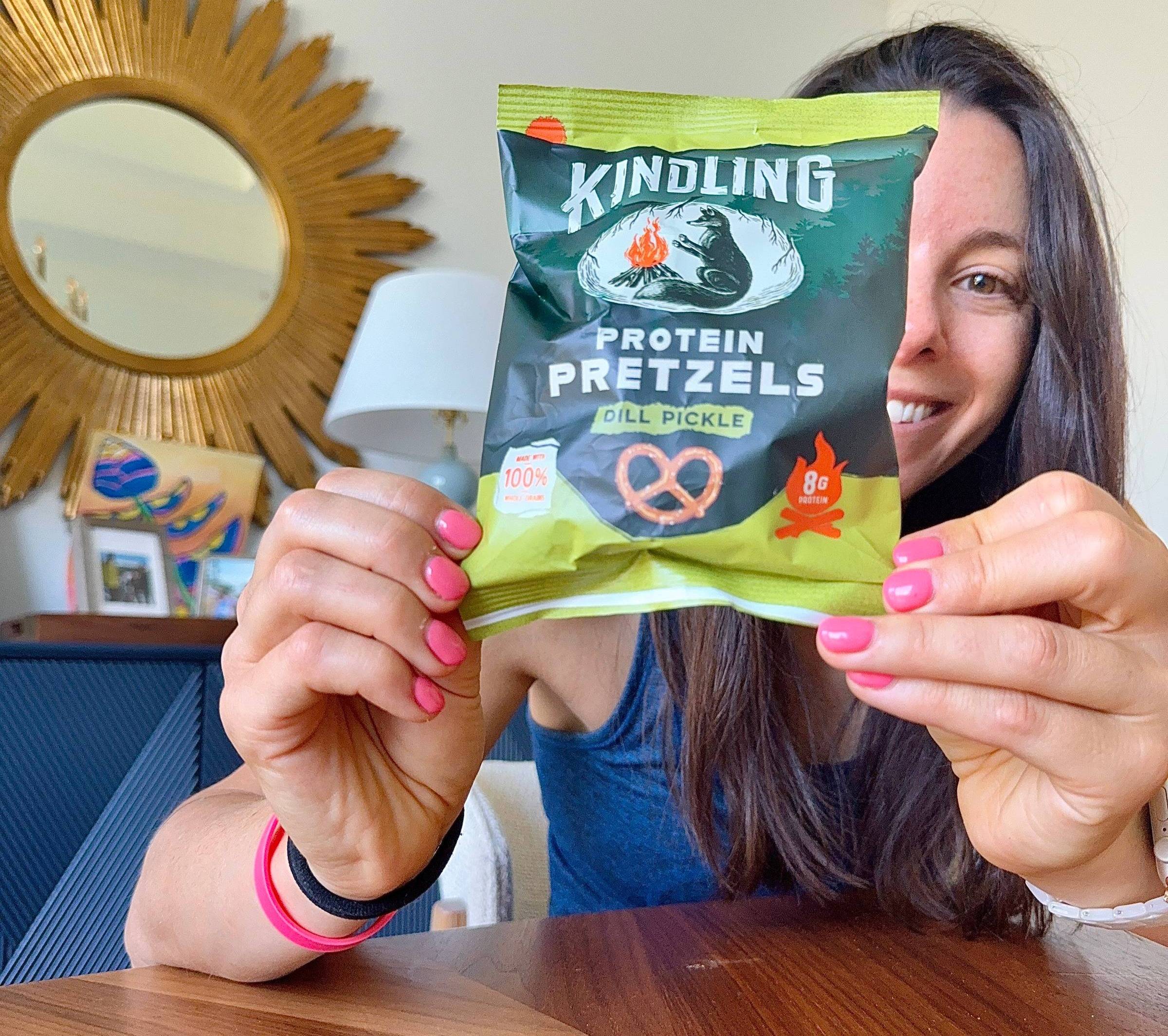 Kacie Barnes Holding Kindling Pretzel Bag