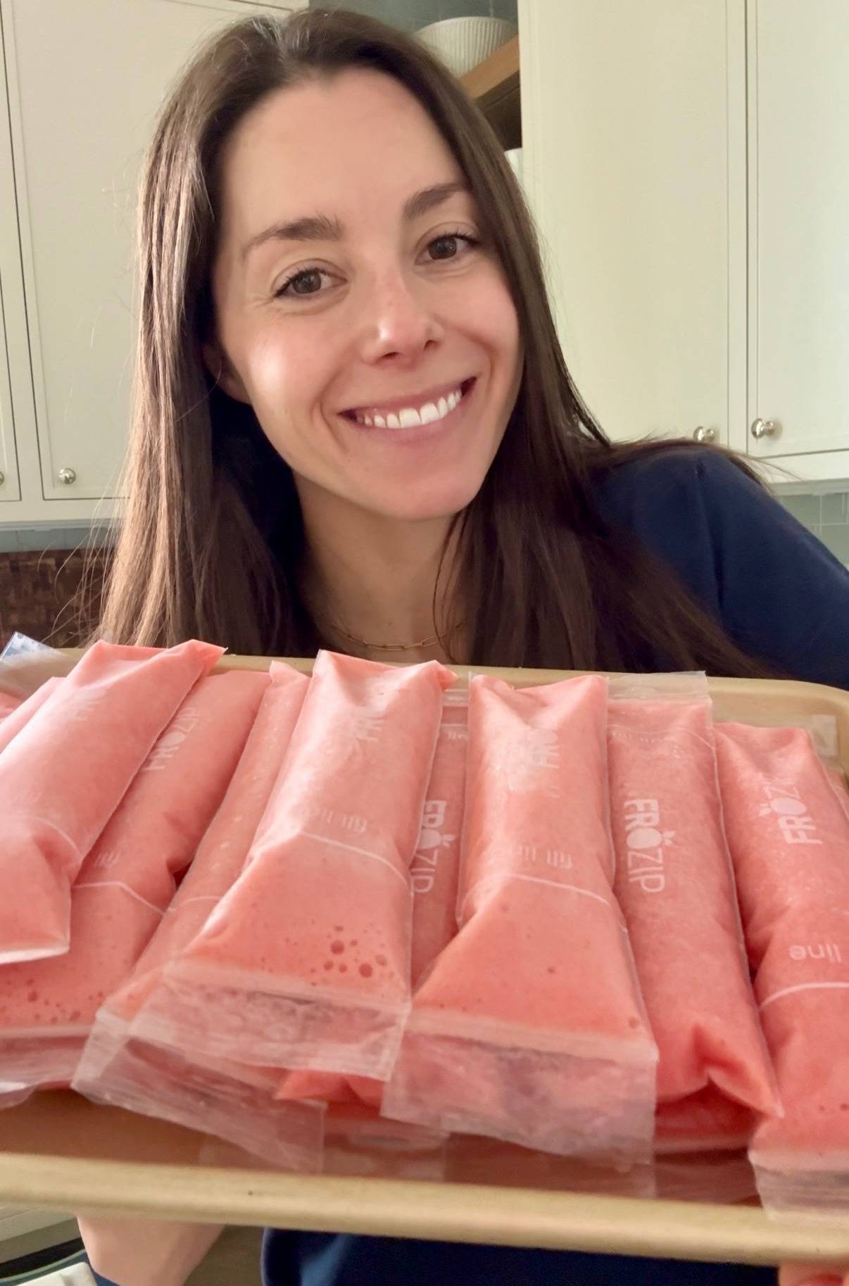 Kacie Barnes Holding Tray of Homemade Popsicles