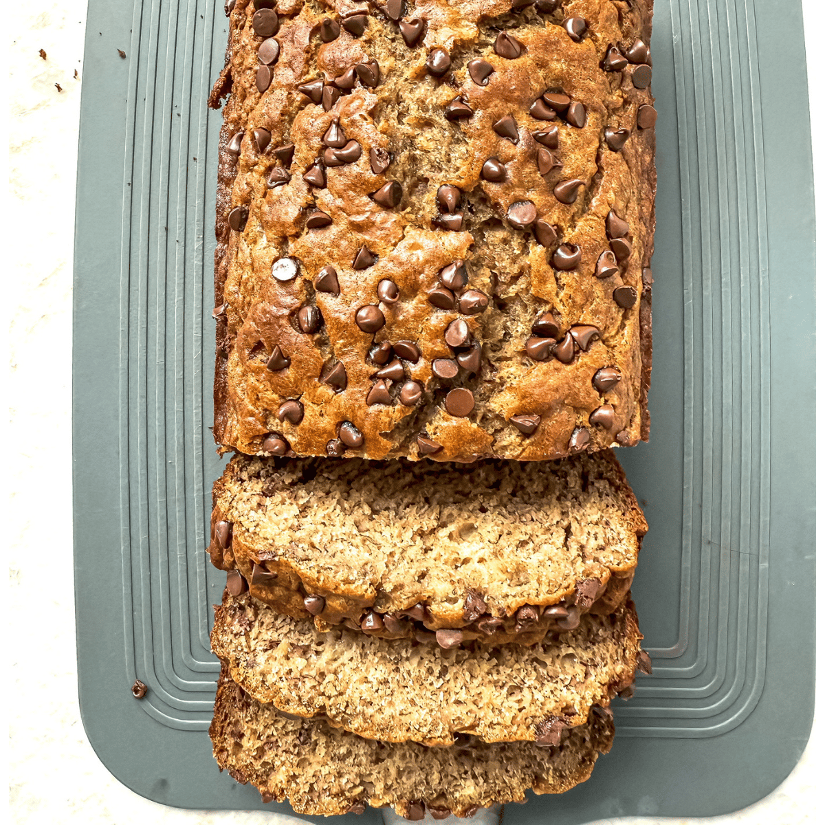 Loaf of Banana Bread With Slices on a Plate