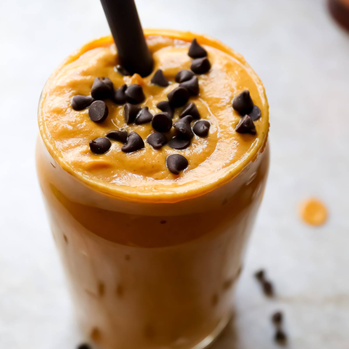 Smoothie in Glass Jar with Mini Chocolate Chips and Straw
