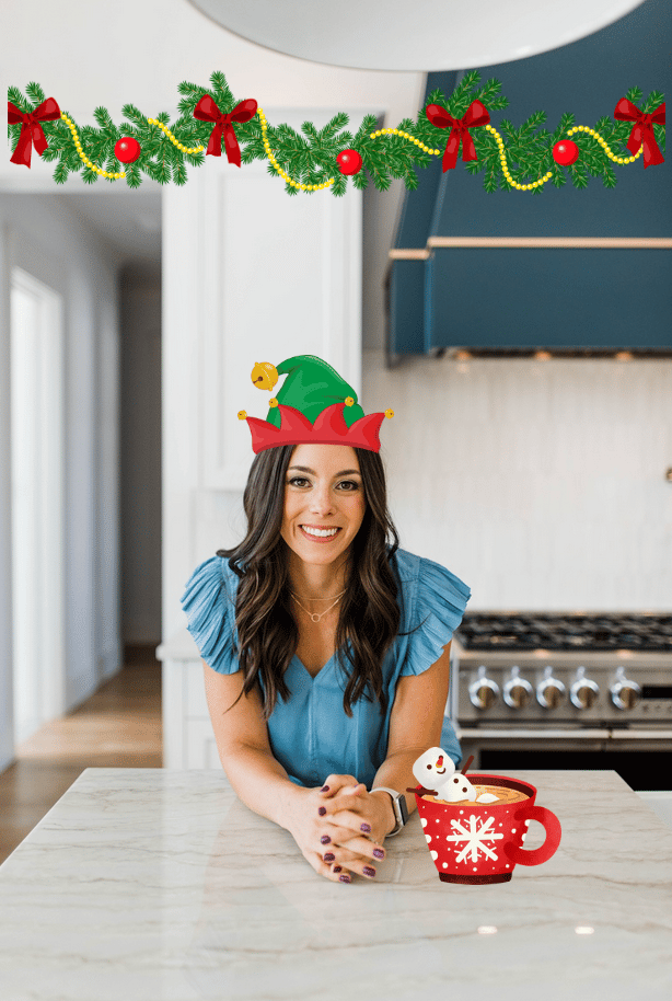 Kacie Barnes with an Elf Hat and Hot Cocoa Cup