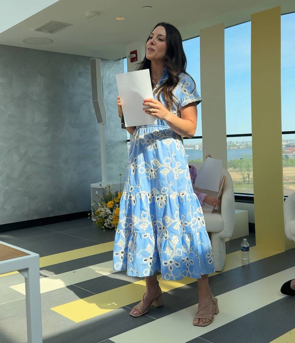 Kacie Barnes Speaking on Stage at Zarbee's Event
