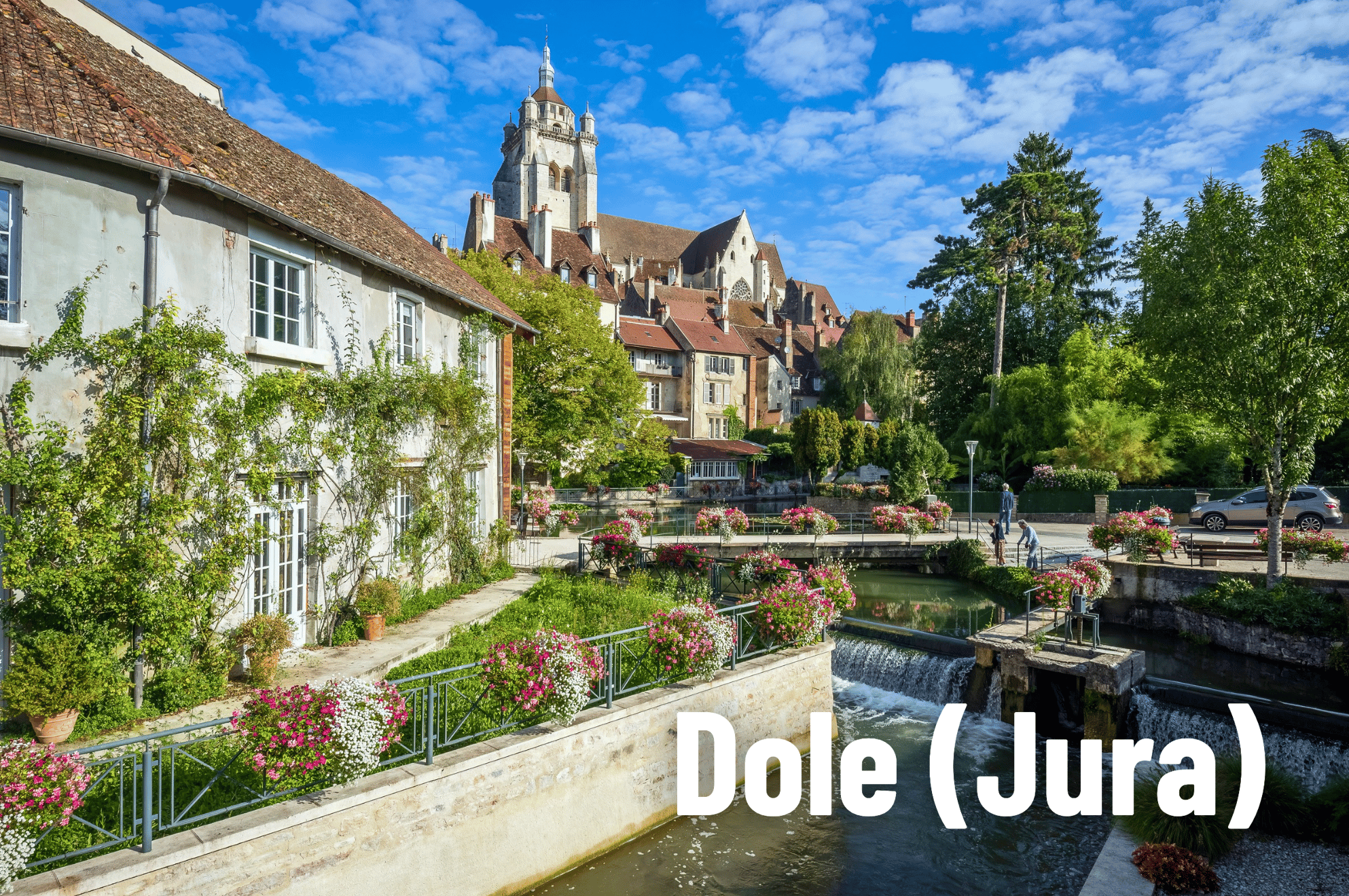 Dole, France — view of the old town and canal