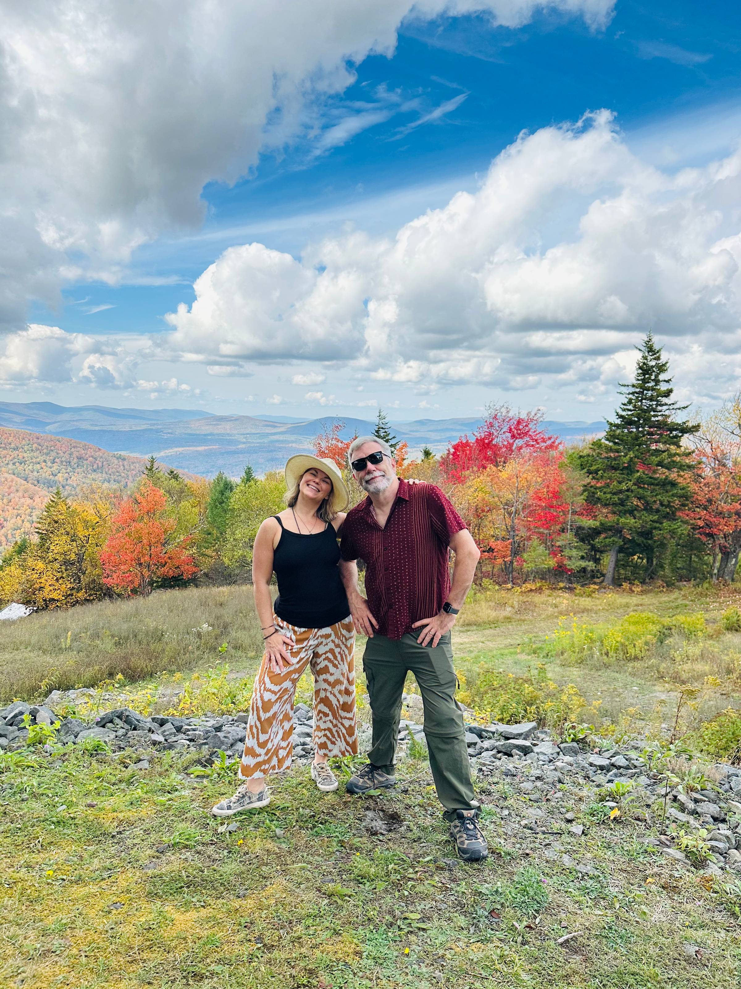 Deb and her husband Doug posing on hunter mountain as the cover image for a podcast episode called 5 Signs Your Sales Energy is Out of Alignment