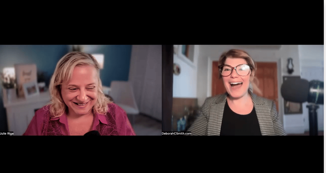 Julie Riga and Deborah C. Smith smiling and laughing while recording Episode #127 of the Mindset to Market podcast: How to Reach Your First $100K: Sales Systems, Lead Generation & Time Management with Julie Riga