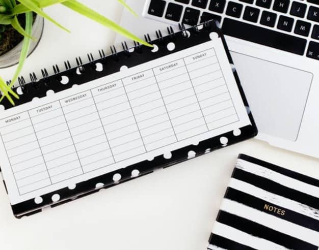 white printer paper on laptop