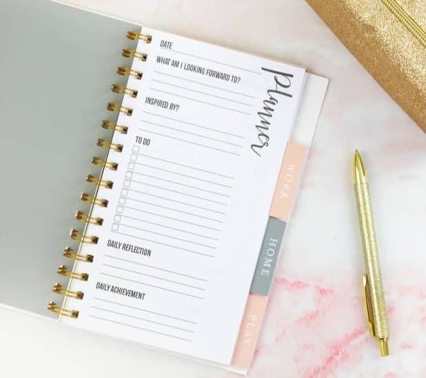 pen beside note book