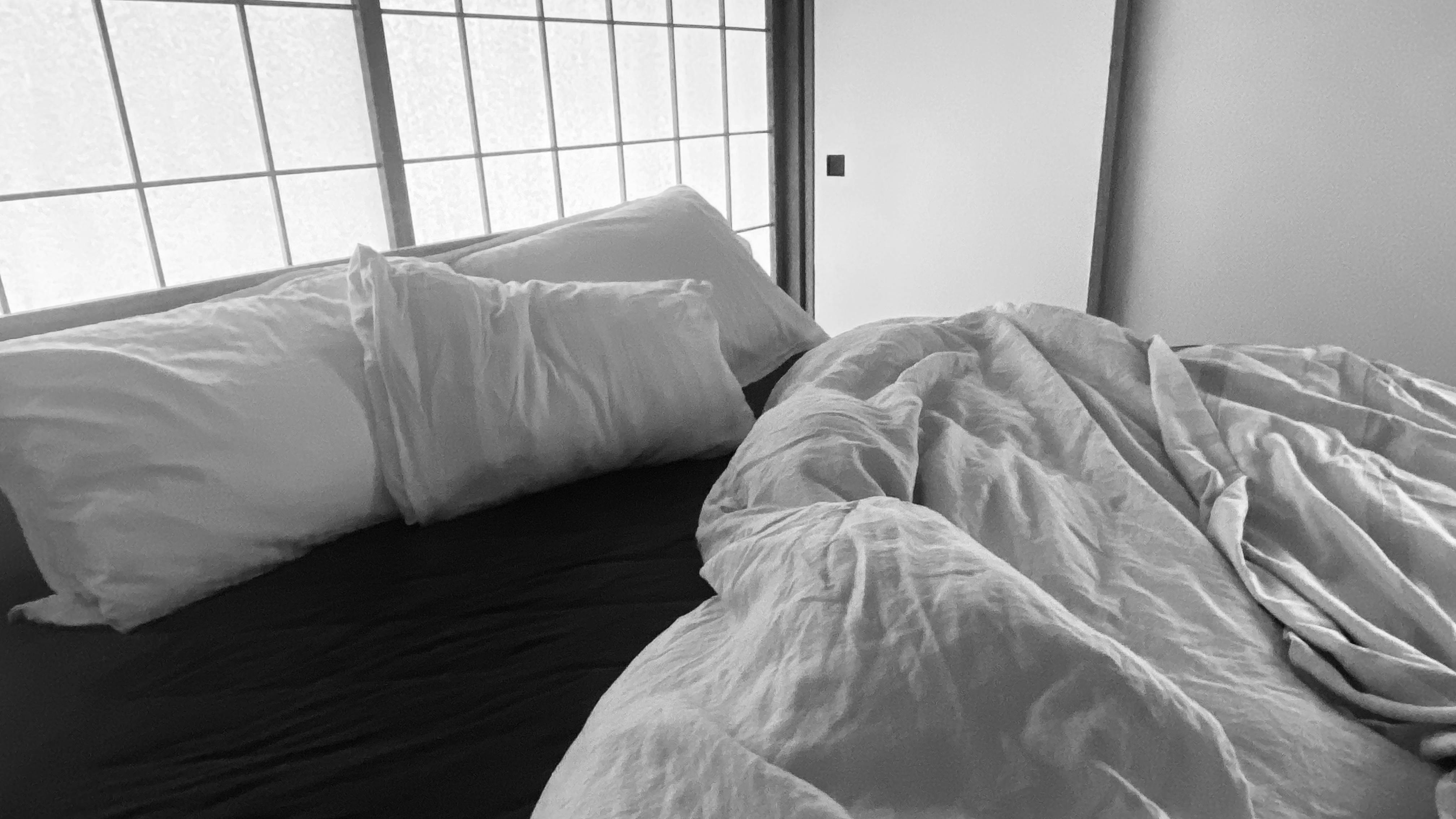 bed in Japanese bedroom