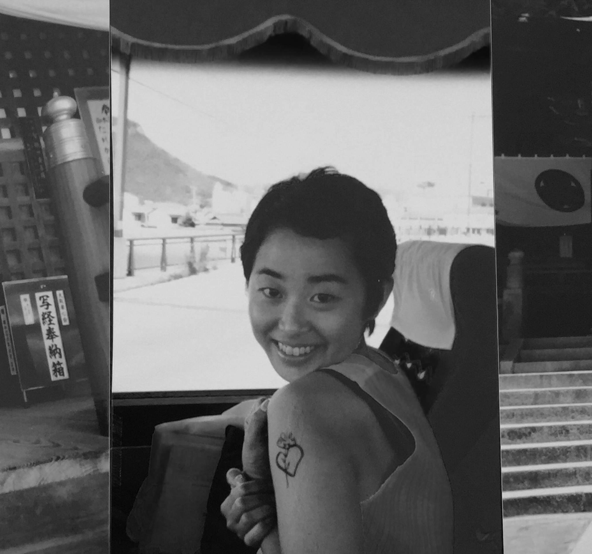 Akiko, aged 24. With a heart tatoo.