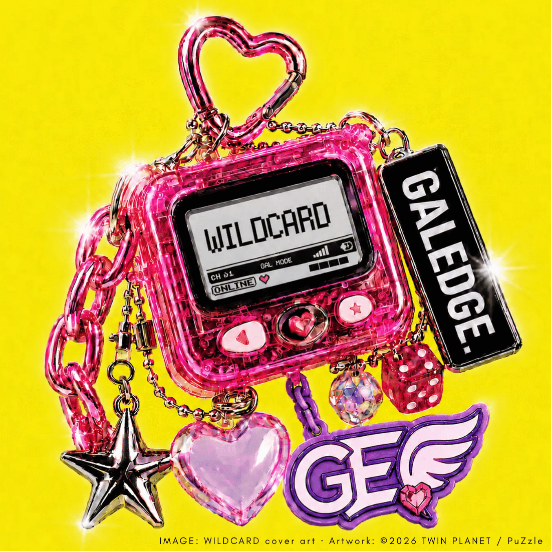 WILDCARD cover art: a pink pager keychain reading “WILDCARD” with GALEDGE. charms on a yellow background. Artwork: ©2026 TWIN PLANET / PuZzle