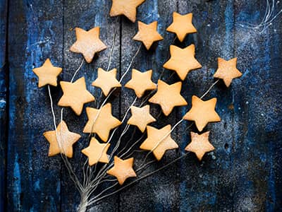 A bunch of star-shaped cookies sitting on top of a table