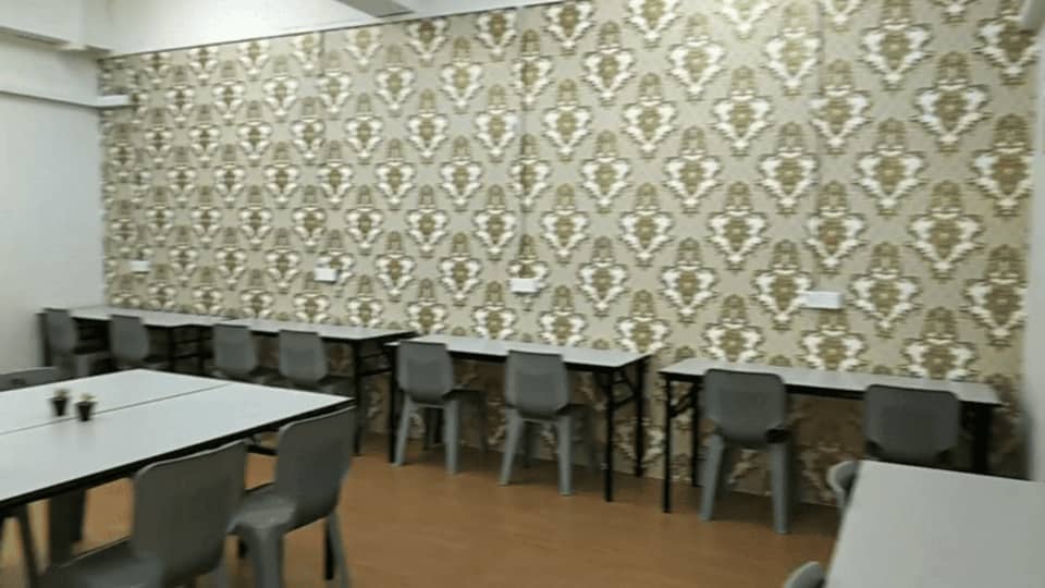 The temporary study room. It has tables, chairs and power sockets.