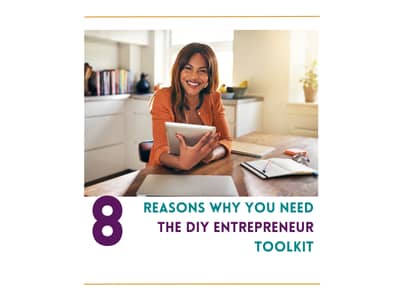 Happy and successful female entrepreneur holding a tablet.