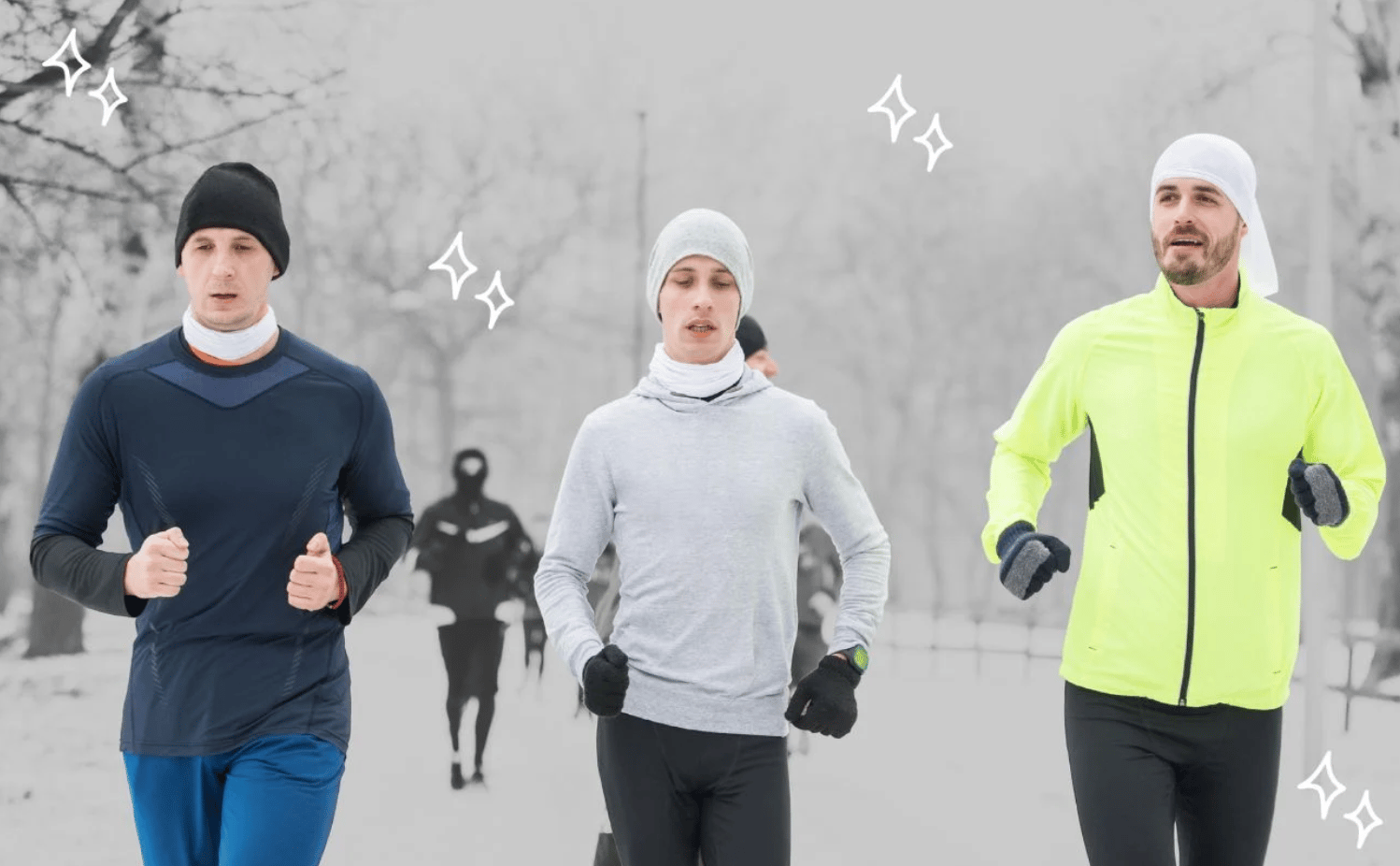 Three people are jogging outdoors on a cold day. They are dressed in winter running attire, including hats, gloves, and layers. The person on the left is wearing a dark shirt and beanie, the person in the middle is in grey, and the person on the right is wearing a bright yellow jacket. The background is a snowy path with bare trees, and there are three sparkle graphics added to the image.