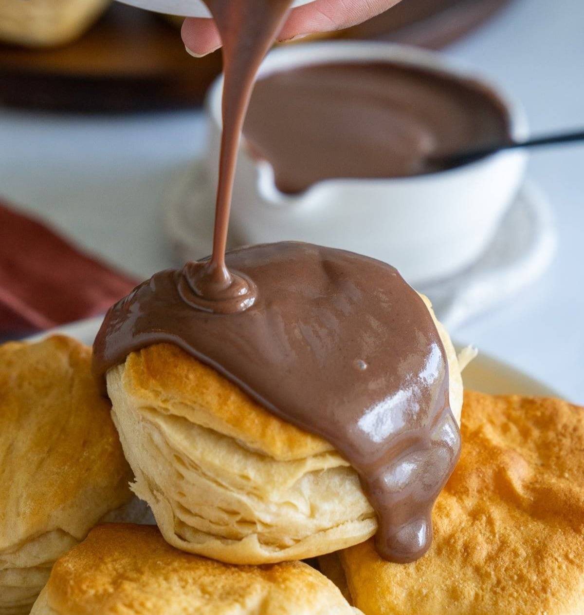 chocolate gravy going on biscuit