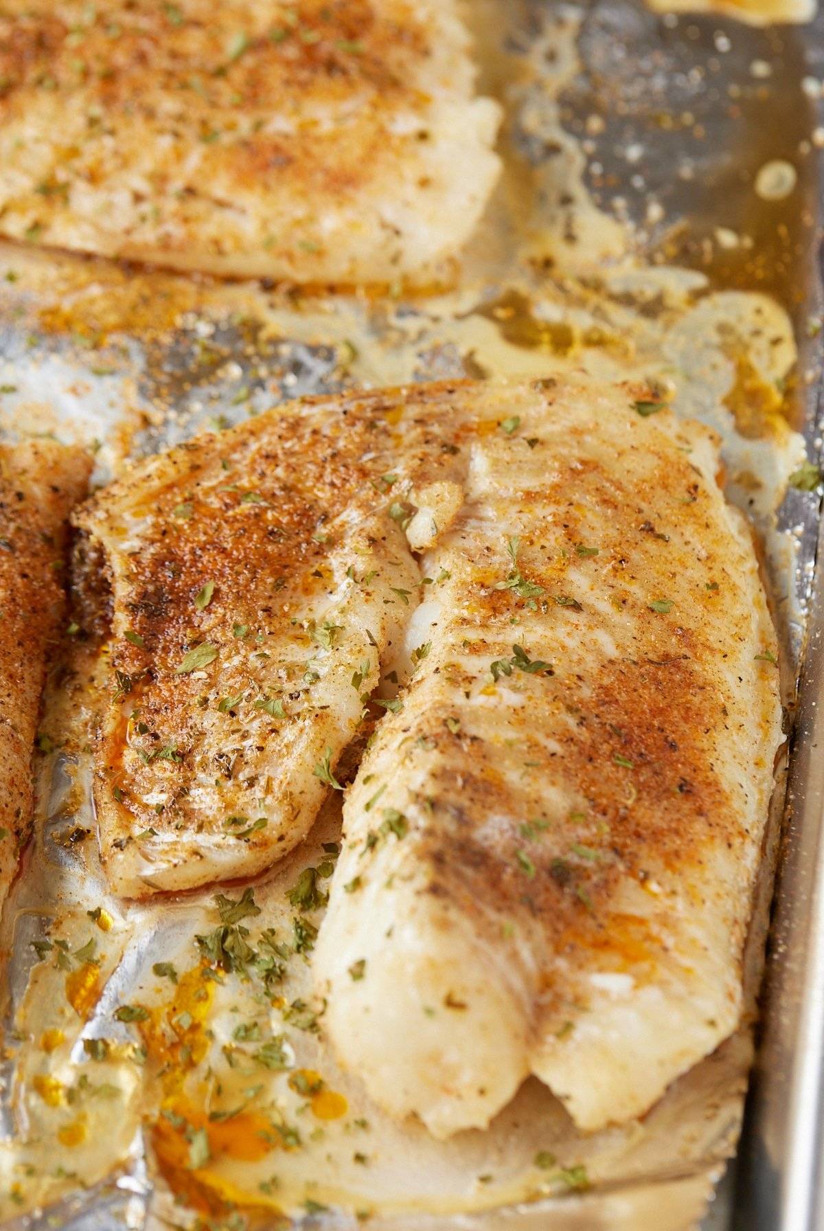 baked fish on baking sheet