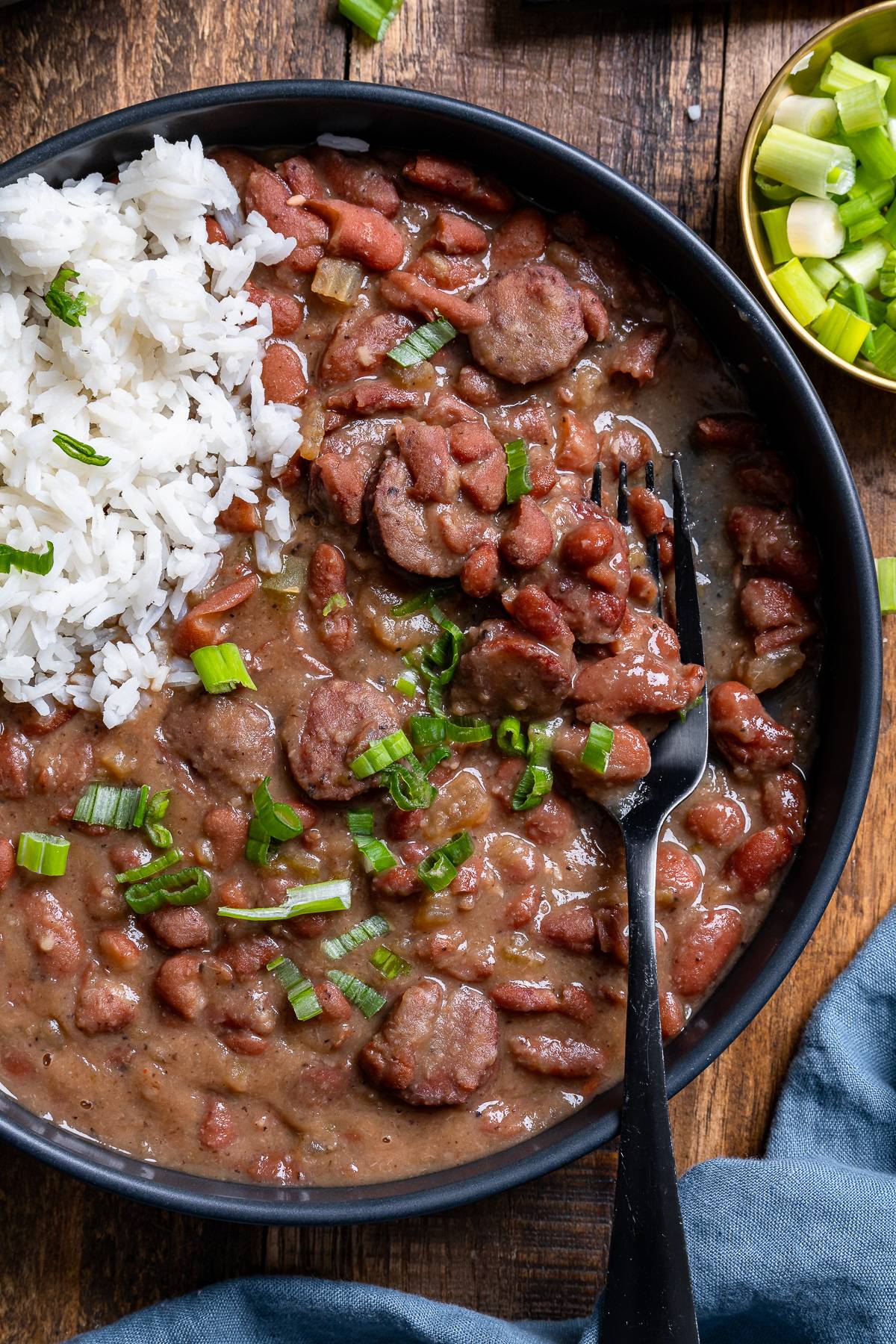 red beans and rice in a bowl with fork in it
