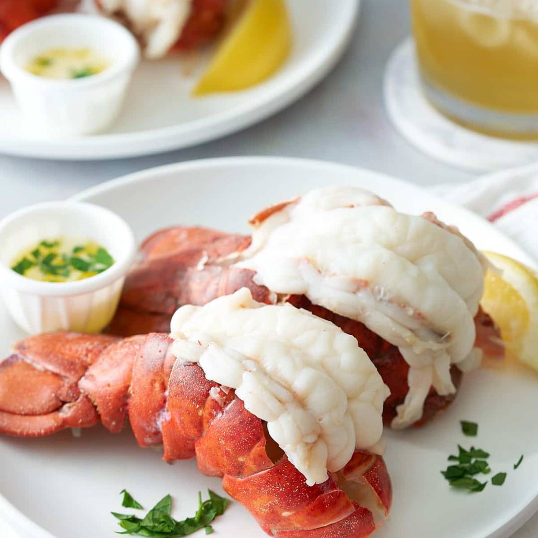 steamed lobster tails on plate