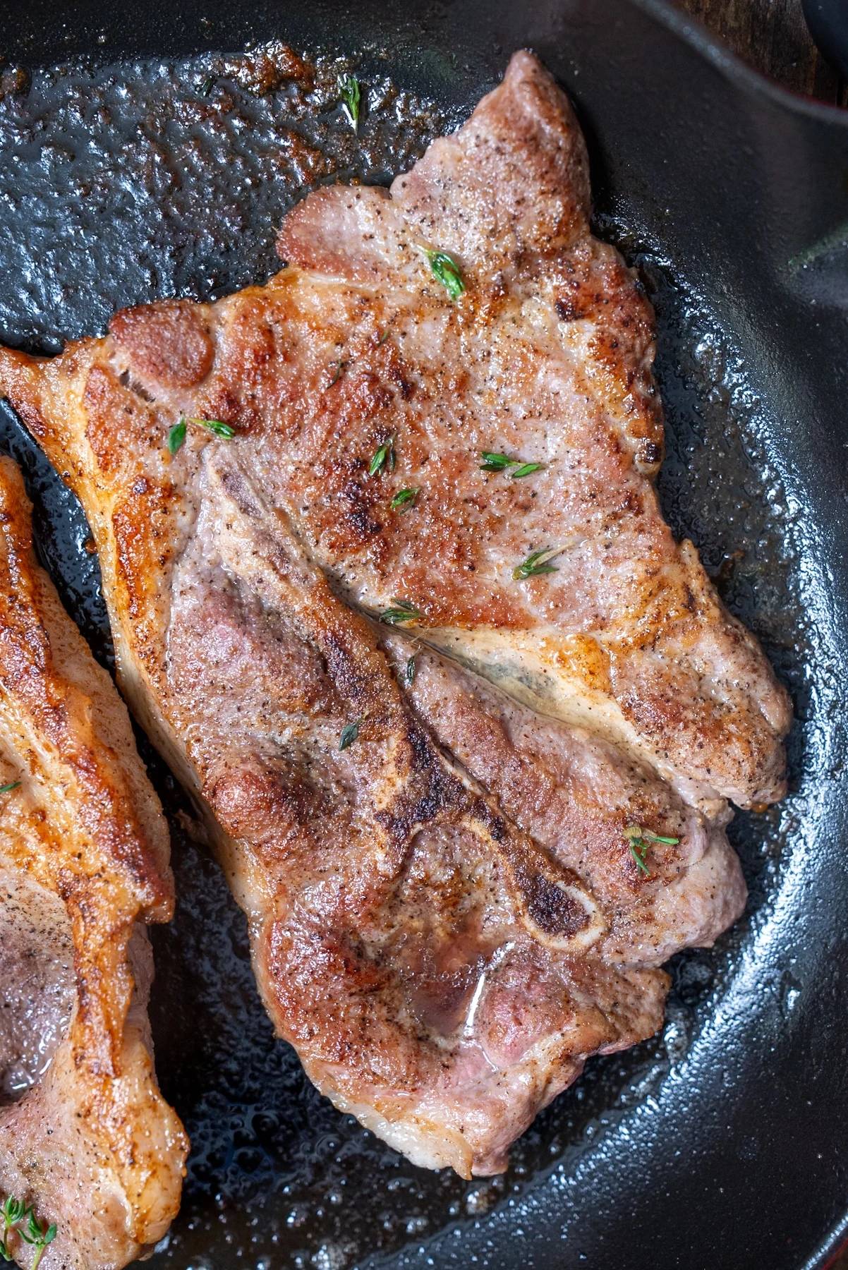 pork steaks in skillet