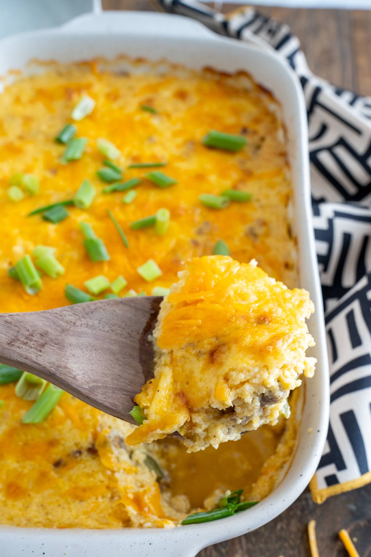 grits casserole lifted up on spoon