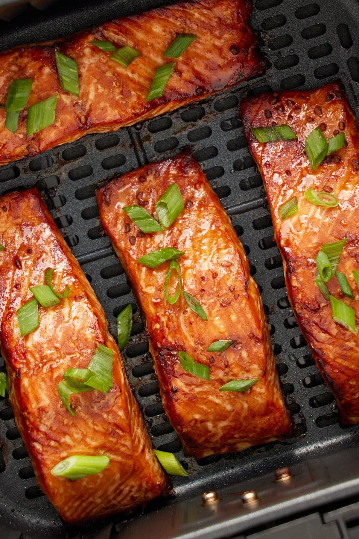 cooked salmon in air fryer basket