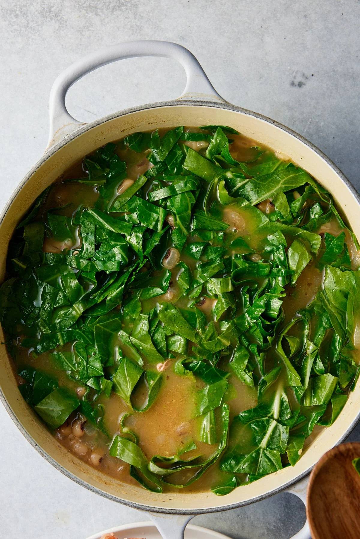 collard green soup in pot