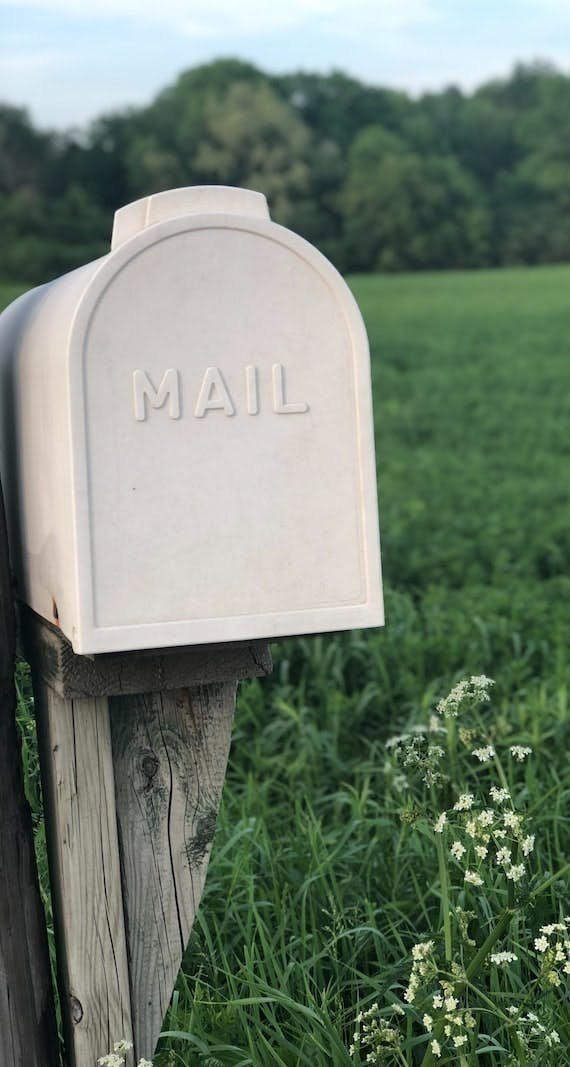 shallow focus photography of gray mailbox