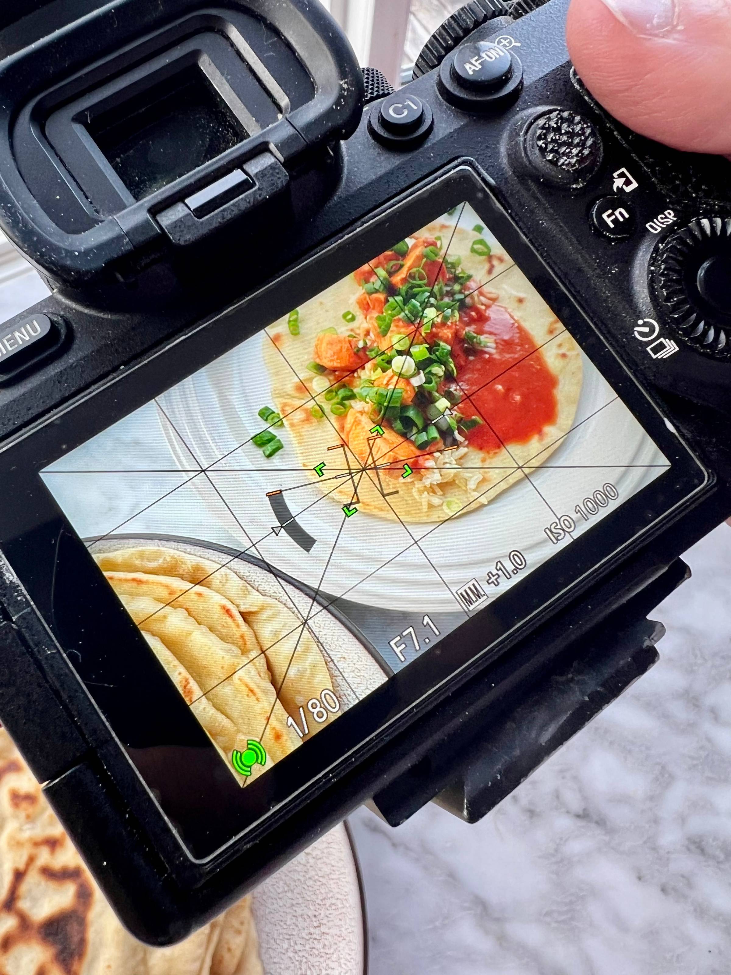 taking a picture of sourdough naan 