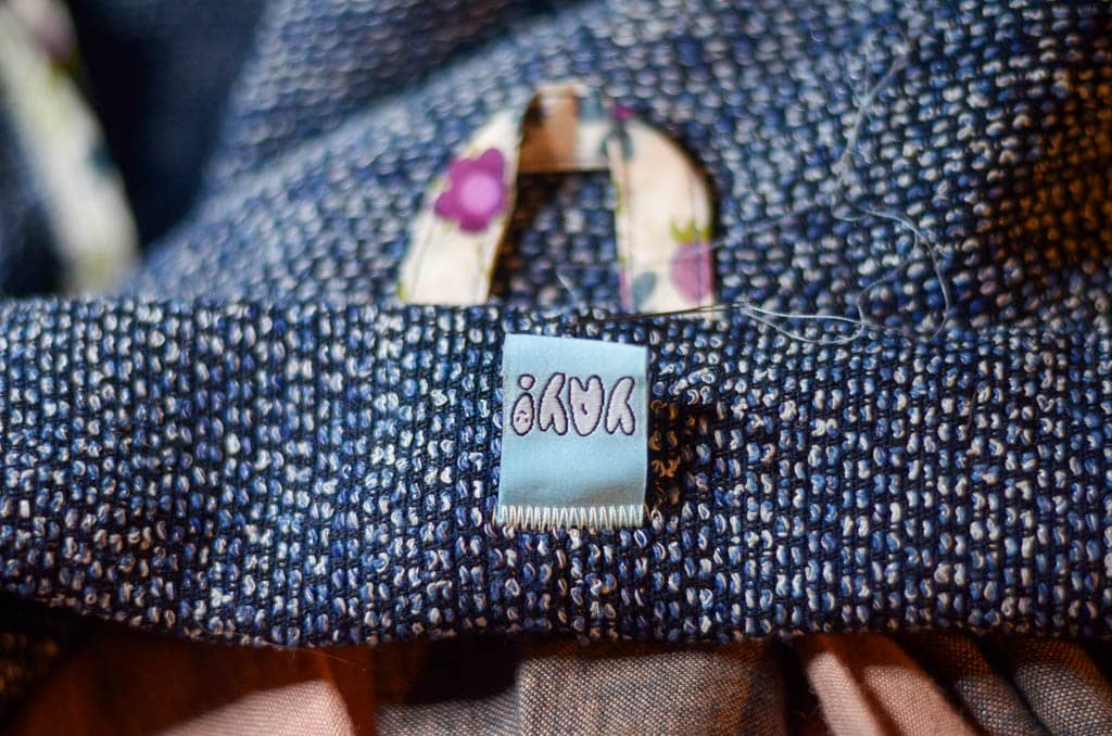 collar detail with woven label and hang tab
