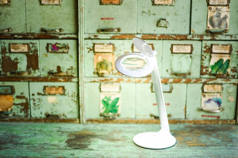 Halo Go light on a vintage seed cabinet