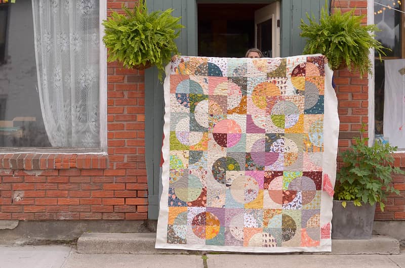Fern holding her Double Time Quilt