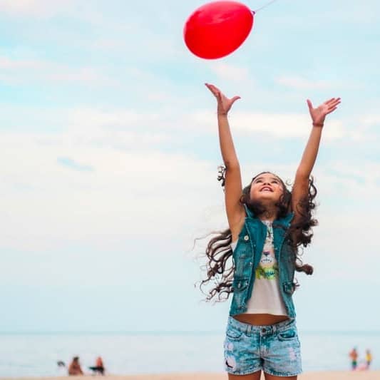 girl raising her hand