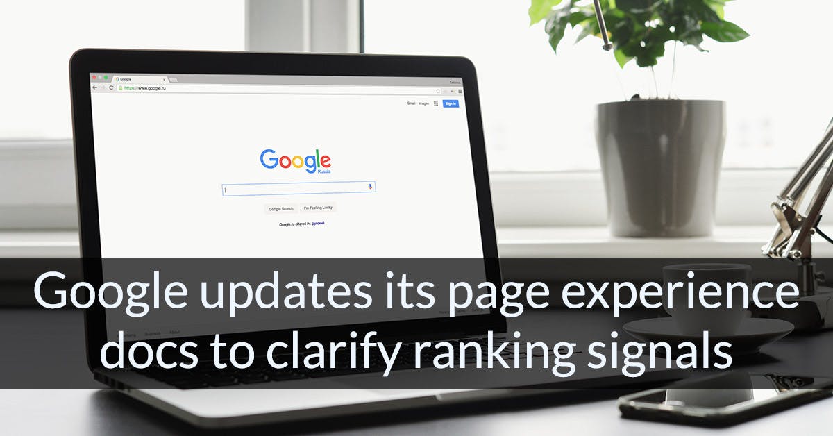 Image of a laptop displaying the Google homepage with the article title "Google updates its page experience docs to clarify ranking signals"