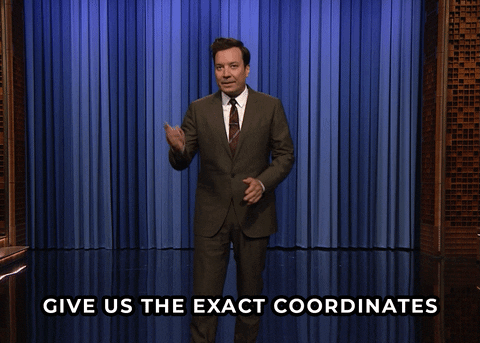 Jimmy Fallon speaking into his wrist: "Give us the exact coordinates"