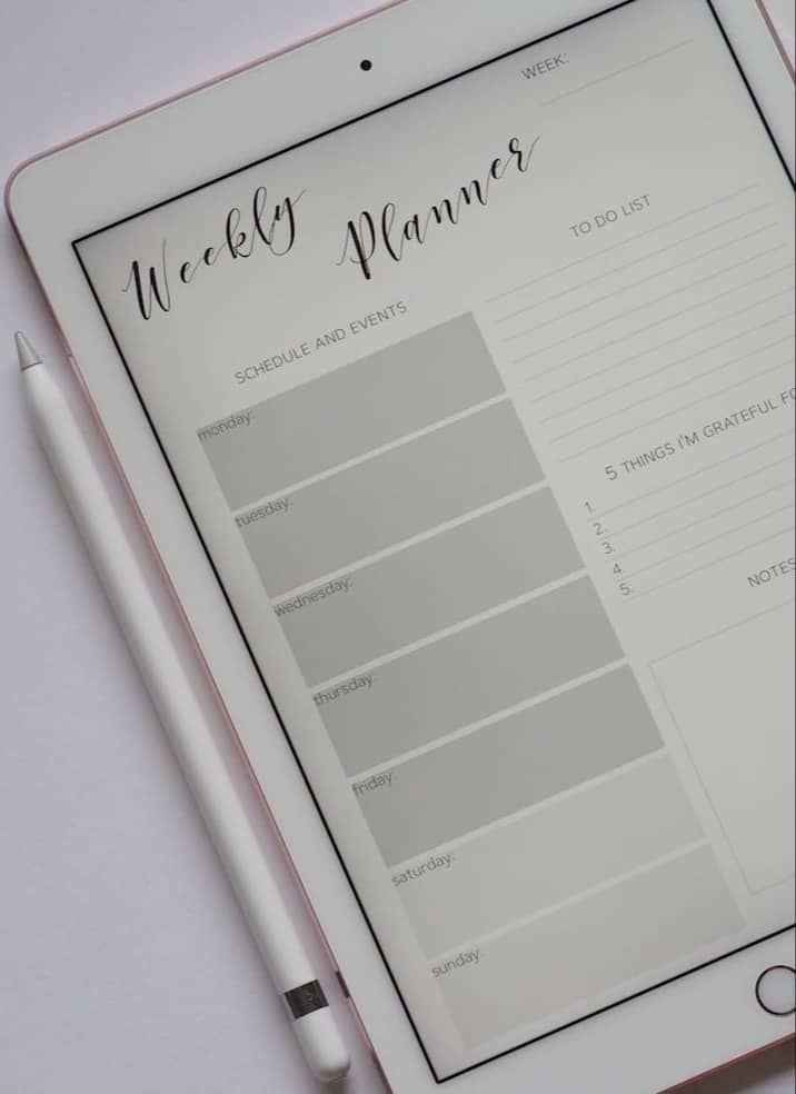 flat lay photography of turned-on silver iPad beside Apple Pencil