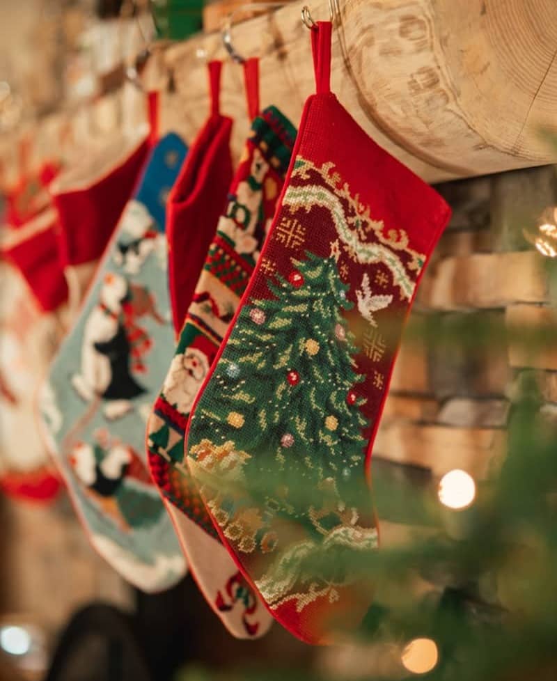 a christmas tree with a red and white cloth from it