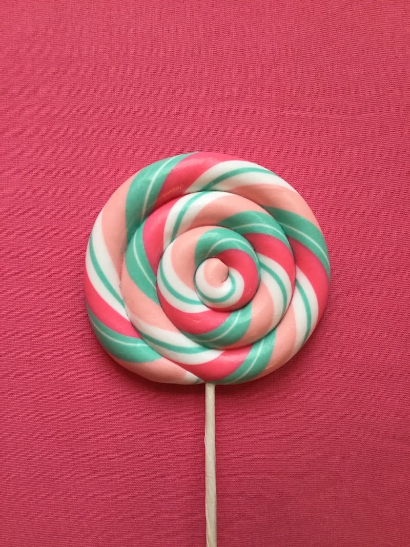 green-red-beige-and-white lollipop