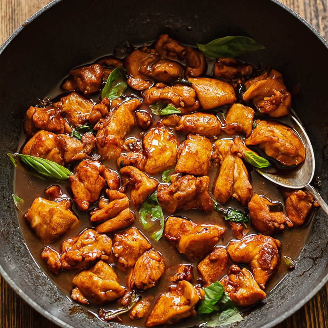 wok of chicken in a sauce