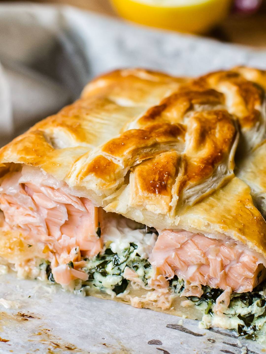 salmon with spinach filling inside pastry